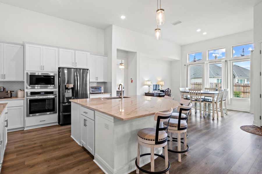 Whether you're prepping a weeknight meal or hosting a holiday gathering, the seamless flow into the living area ensures you’re always part of the conversation.