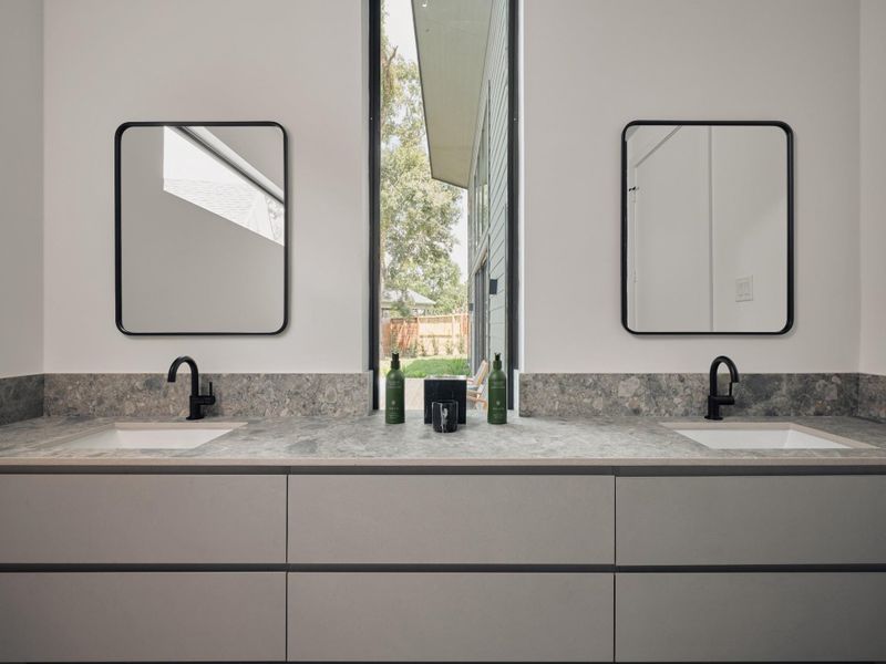 Double vanity with window in the primary bathroom