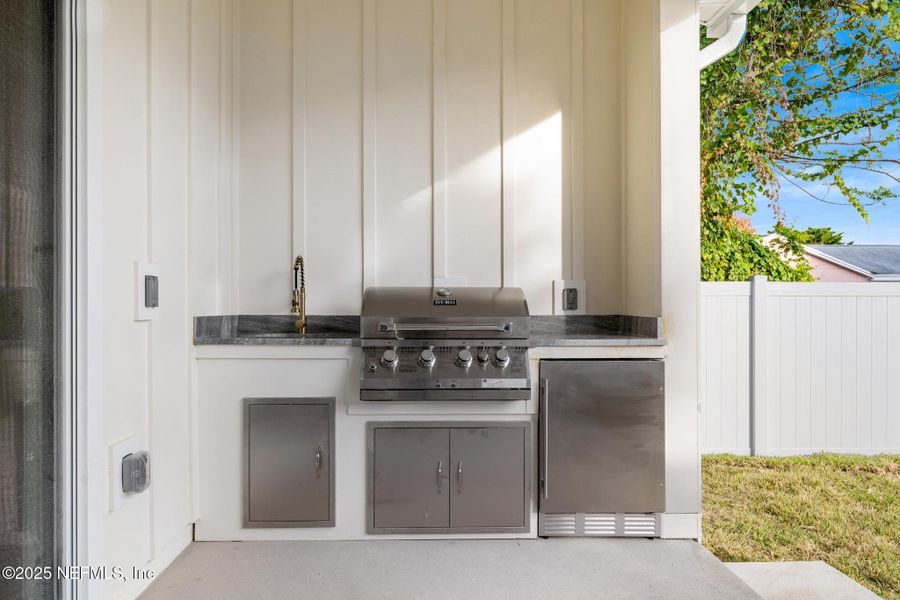 Exterior details and patio area of a home in , Jacksonville Beach (Image 31). Exterior details and patio area of a home in , Jacksonville Beach (Image 31).