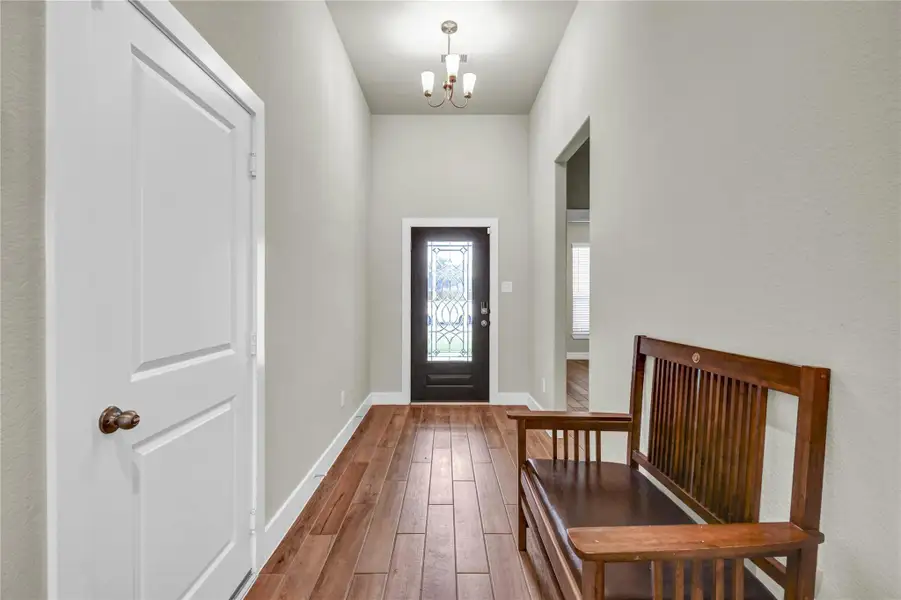 Beautiful entrance with wood-look tile Beautiful entrance with wood-look tile