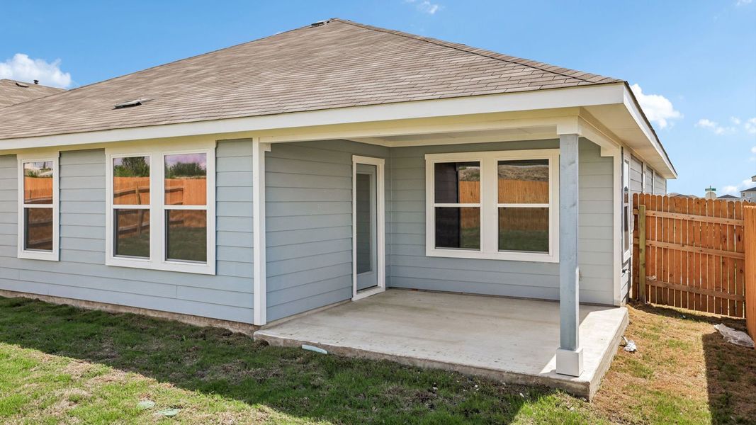 Exterior details and patio area of a home in Prairie Lakes, Buda (Image 25).