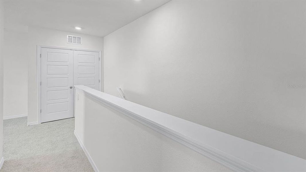 Spacious, unfurnished interior of a new home in Harmony at Lake Eloise, Winter Haven (Image 27).