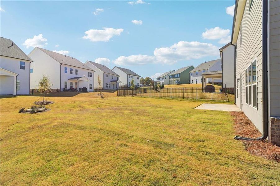 Exterior details and patio area of a home in East Harbor II at Chestatee, Dawsonville (Image 25).