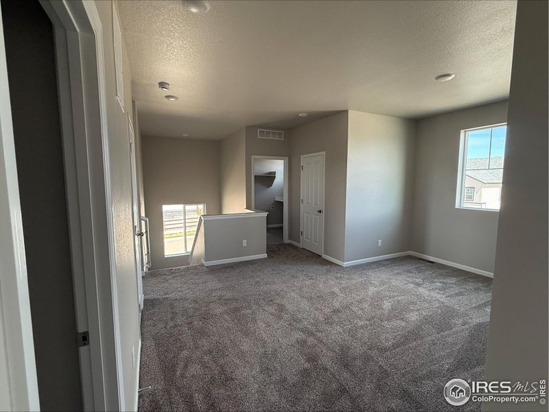 Spacious, unfurnished interior of a new home in Highlands Preserve, Mead (Image 13).
