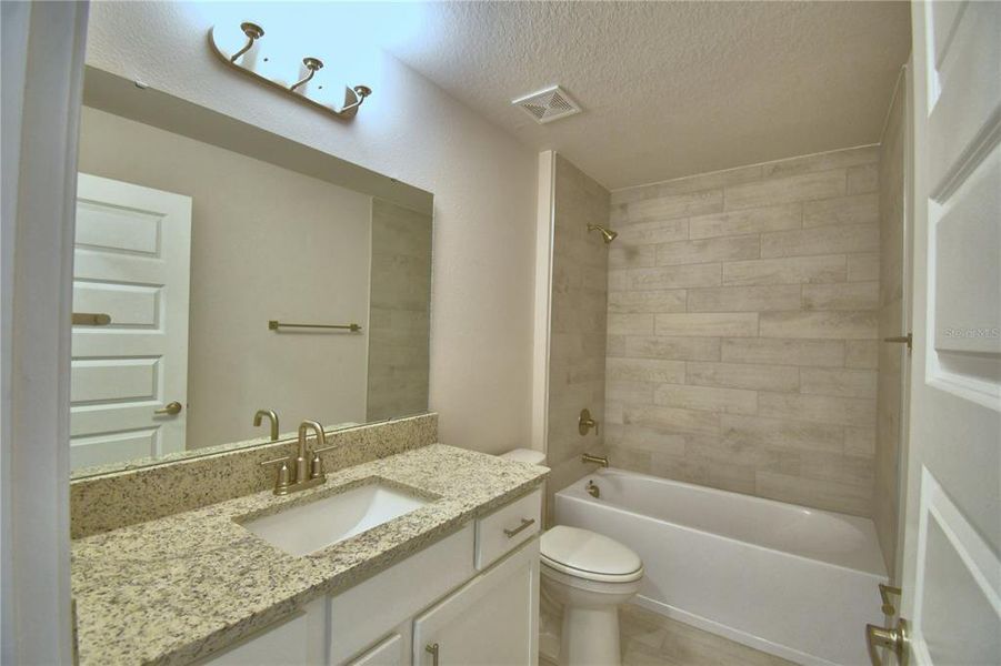 Furnished interior view inside a new home in Lake Juliana Estates, Auburndale (Image 6).