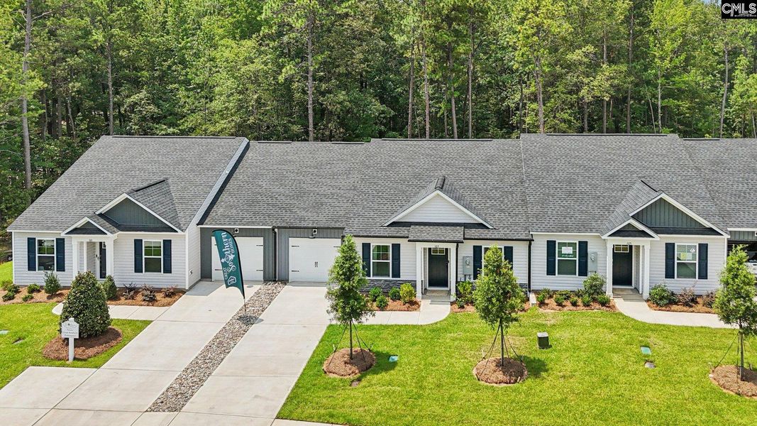 Front exterior of a new home in Piney Woods Bluff, Columbia, SC, highlighting curb appeal (Image 21). Front exterior of a new home in Piney Woods Bluff, Columbia, SC, highlighting curb appeal (Image 21).