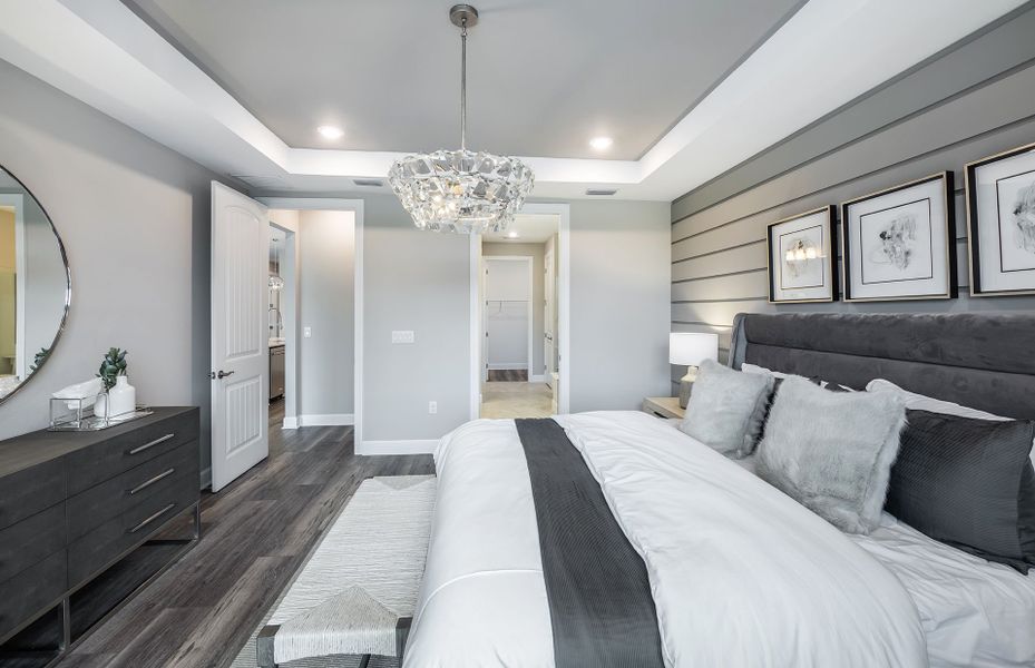 Representative furnished interior of a home built from the Mystique by DiVosta in BeachWalk by Manasota Key, Englewood (Image 35).