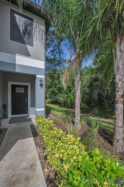 Front exterior of a new home in , Holiday, FL, highlighting curb appeal (Image 25).