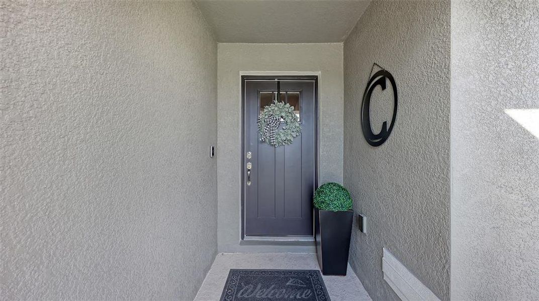 Exterior details and patio area of a home in Aviary at Rutland Ranch, Parrish (Image 25).