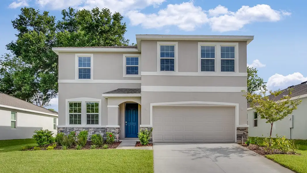Representative exterior photo of a completed home built from the Coral by D.R. Horton in Twisted Oaks, Wildwood, FL (Image 1). Representative exterior photo of a completed home built from the Coral by D.R. Horton in Twisted Oaks, Wildwood, FL (Image 1).