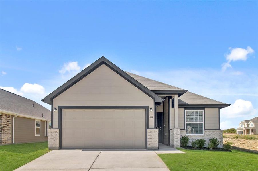 Front exterior of a new home in Retreat at Fossil Creek, Fort Worth, TX, highlighting curb appeal (Image 1). Front exterior of a new home in Retreat at Fossil Creek, Fort Worth, TX, highlighting curb appeal (Image 1).