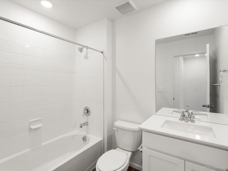 Furnished interior view inside a new home in Skyview at High Point, Aurora (Image 6).