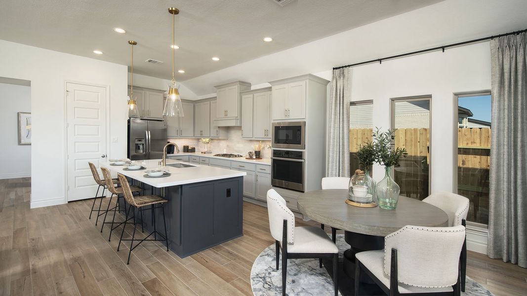Representative furnished interior of a home built from the 2935M by Perry Homes in Lakes of Cane Island, Katy (Image 10).