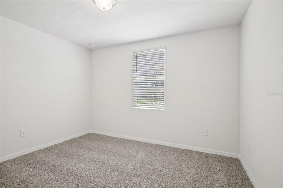 Spacious, unfurnished interior of a new home in Villamar - Signature Series, Winter Haven (Image 23).