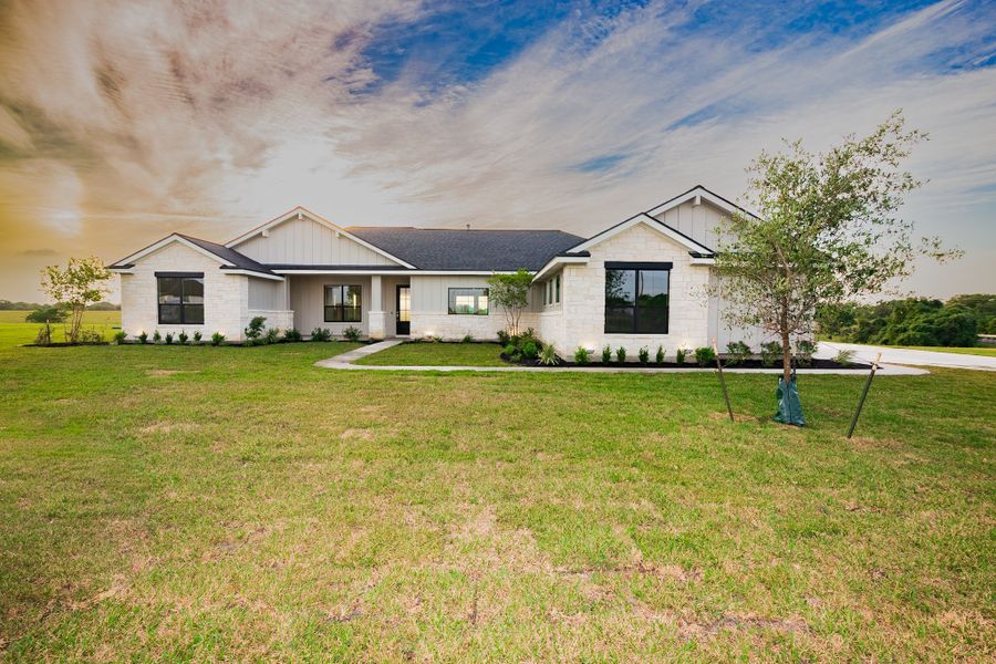 Representative exterior photo of a completed home built from the Seguin by Steve Klein Custom Builder in Escalera Ranch 1833, Victoria, TX (Image 1). Representative exterior photo of a completed home built from the Seguin by Steve Klein Custom Builder in Escalera Ranch 1833, Victoria, TX (Image 1).