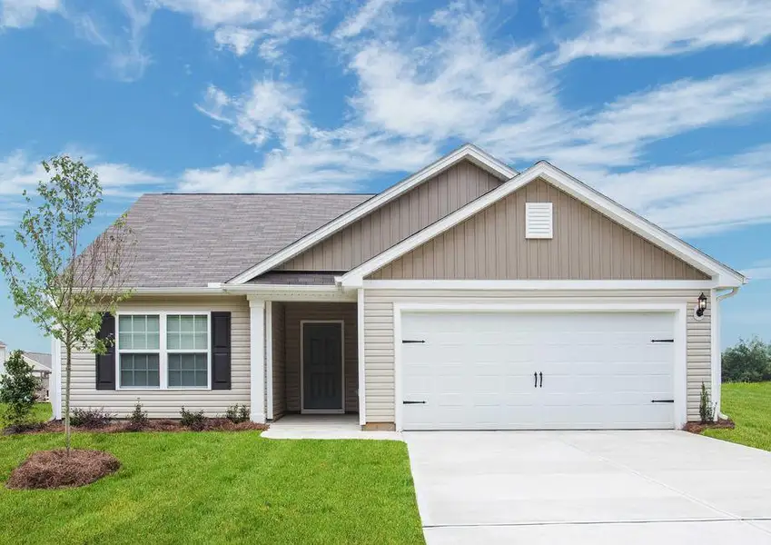 Alamance home front with landscaping, dual-car garage, and tan finish siding