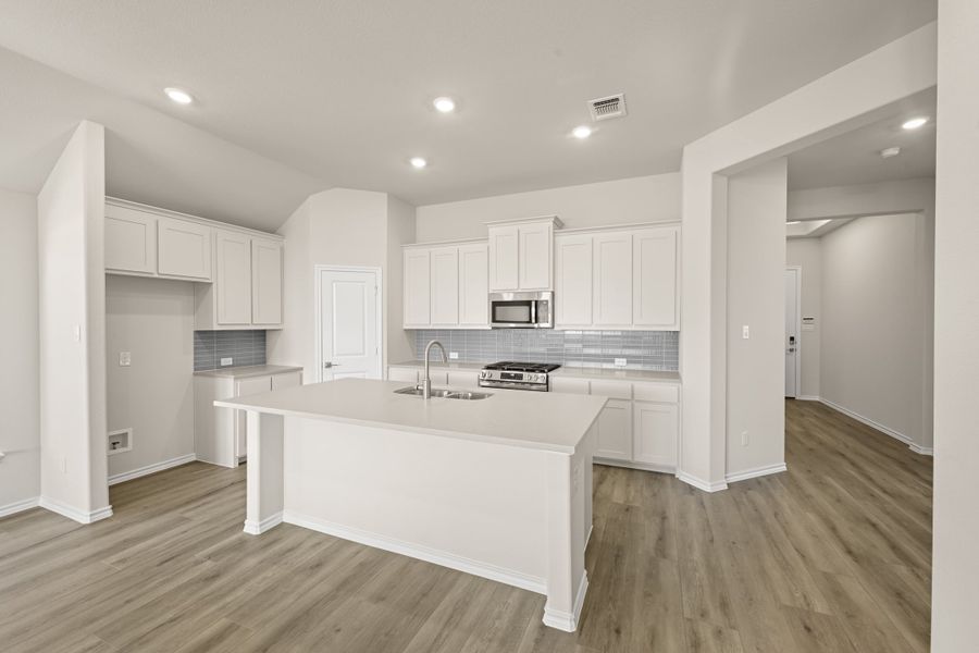Furnished interior view inside a new home in Hunters Ridge, Crowley (Image 5).