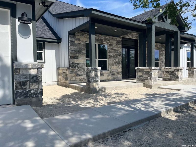 Exterior details and patio area of a home in , Fischer (Image 4). Exterior details and patio area of a home in , Fischer (Image 4).
