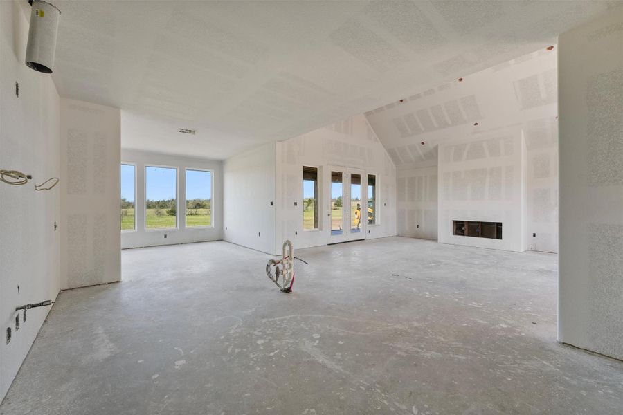 Spacious kitchen with a large island, double-sided storage, and generous bar seating. Spacious kitchen with a large island, double-sided storage, and generous bar seating.