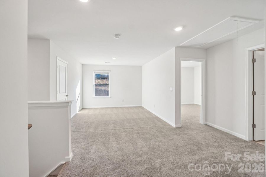 Spacious, unfurnished interior of a new home in Rydele Heights, Asheville (Image 27).