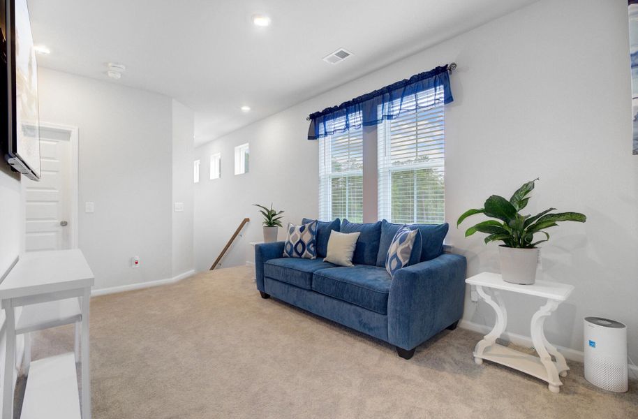 Furnished interior view inside a new home in Limehouse Village: Row Collection, Summerville (Image 9).