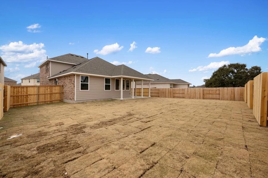 Exterior details and patio area of a home in Berry Creek Highlands, Georgetown (Image 31).