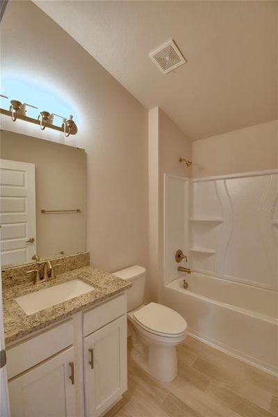 Furnished interior view inside a new home in , Auburndale (Image 11).