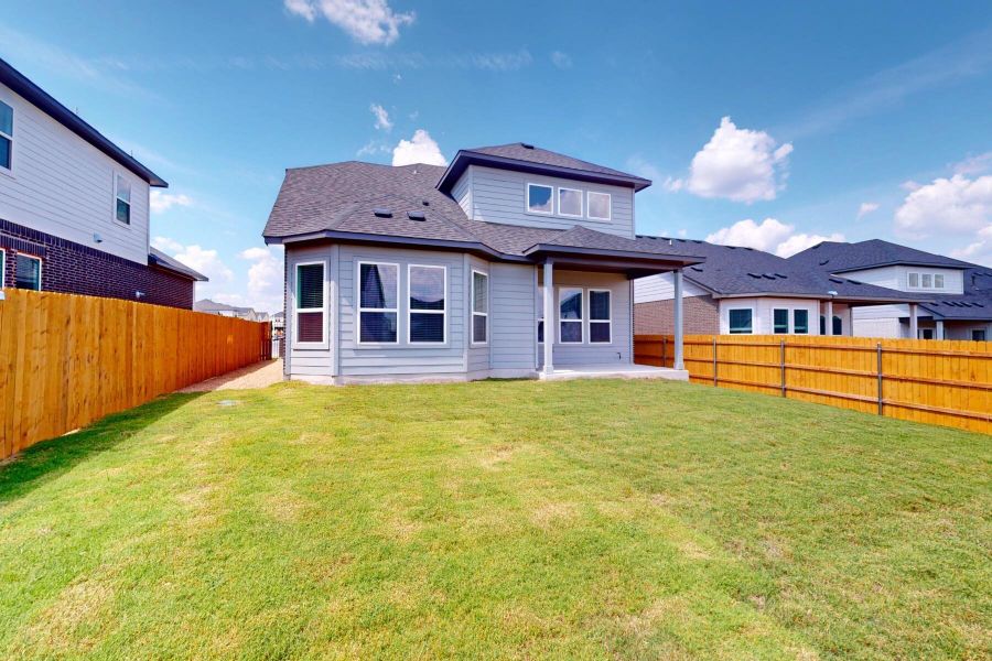 Exterior details and patio area of a home in Cascades at Onion Creek, Austin (Image 3).