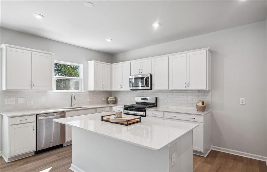 Furnished interior view inside a new home in Watermist at Mirror Lake, Villa Rica (Image 6).