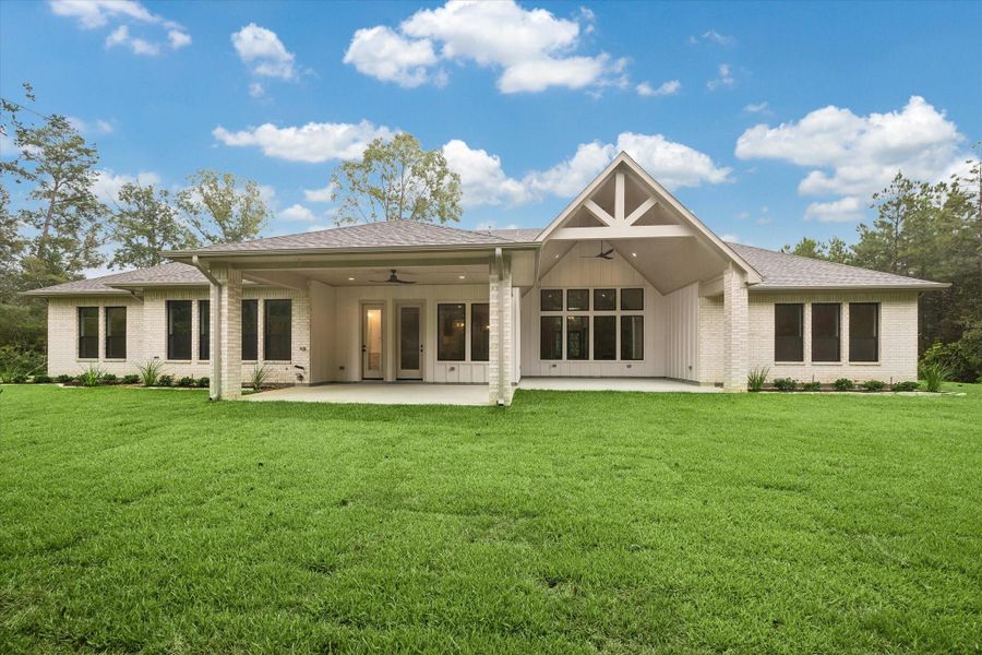 Exterior details and patio area of a home in Republic Grand Ranch, Willis (Image 3).