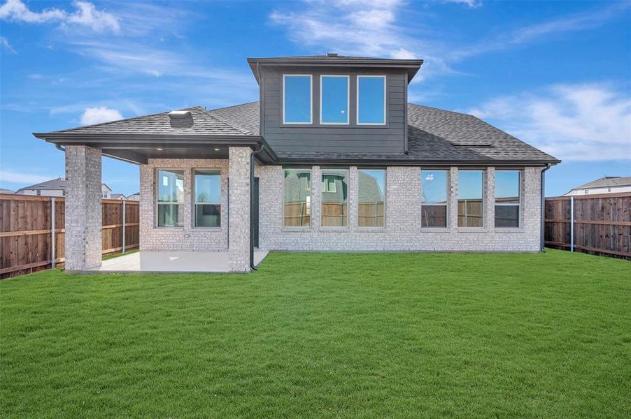 Exterior details and patio area of a home in Lily Creek at Sutton Fields, Aubrey (Image 19). Exterior details and patio area of a home in Lily Creek at Sutton Fields, Aubrey (Image 19).