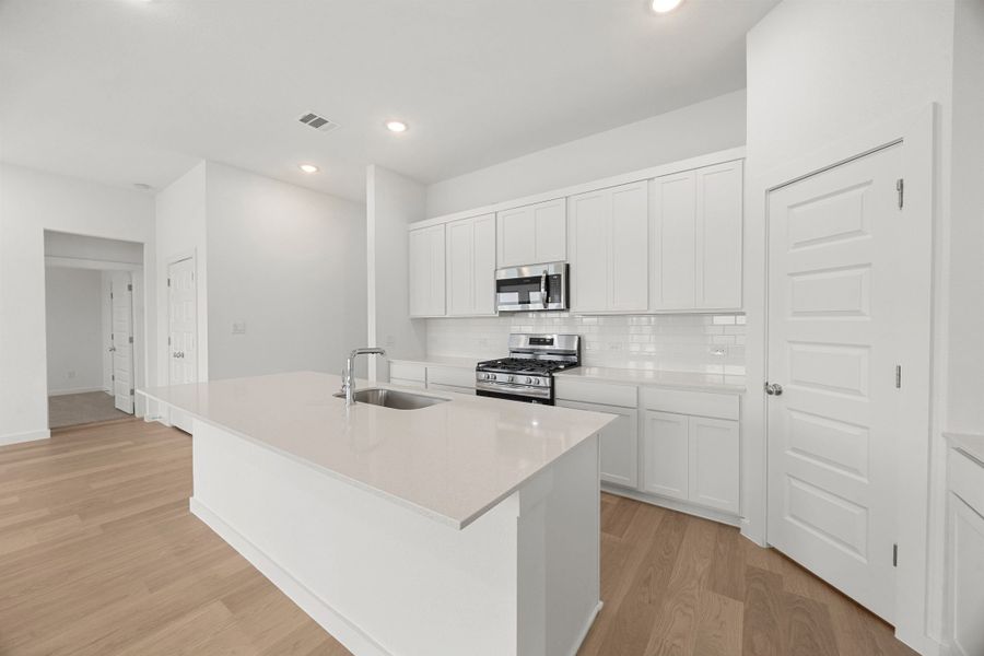 Representative furnished interior of a home built from the Brazos | Prairie Winds by Trophy Signature Homes in Prairie Winds, Hutto (Image 8).