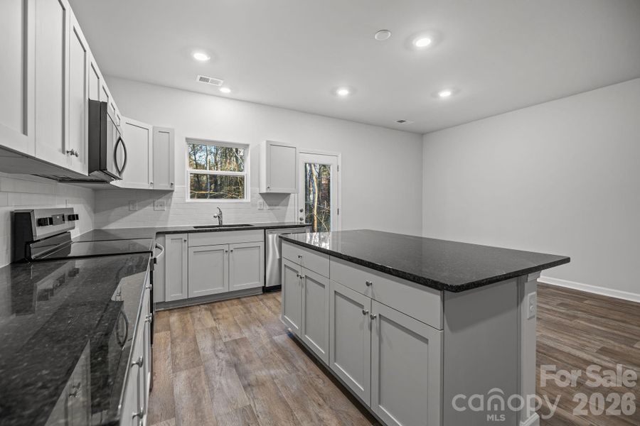 Furnished interior view inside a new home in Townes at Ribbon Walk, Charlotte (Image 8).