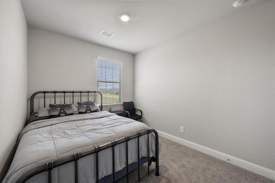 Furnished interior view inside a new home in Dove Creek, Midlothian (Image 19).