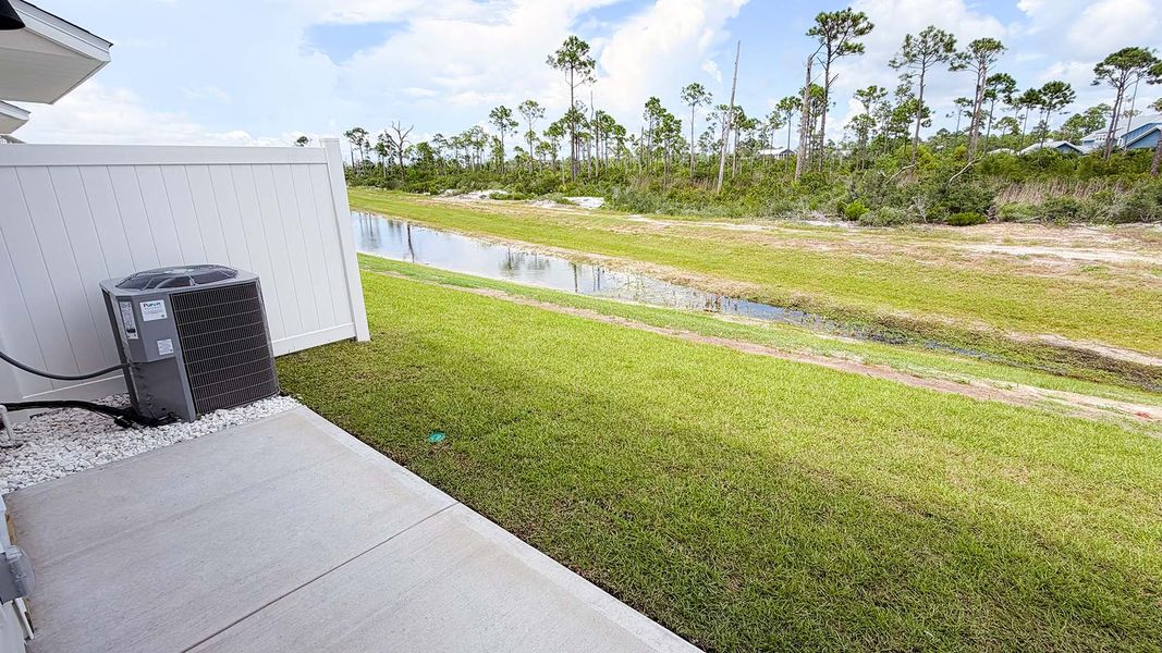 Exterior details and patio area of a home in WindMark Beach, Port Saint Joe (Image 22).