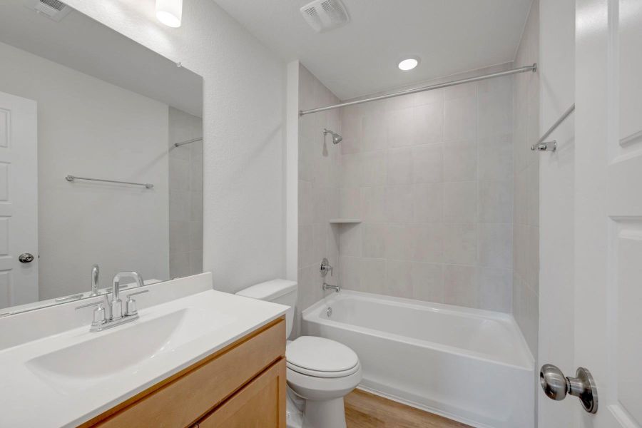Furnished interior view inside a new home in Lone Star Landing, Montgomery (Image 10).