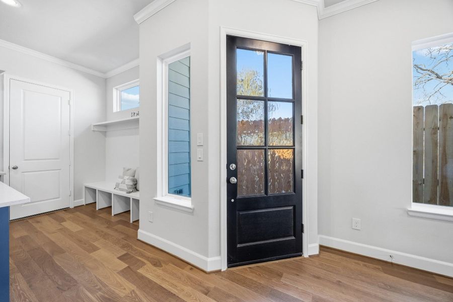 Organized Elegance: Elevate your entryway with a meticulously designed built-in bench and cubbies, blending form with function in your home’s greeting space.