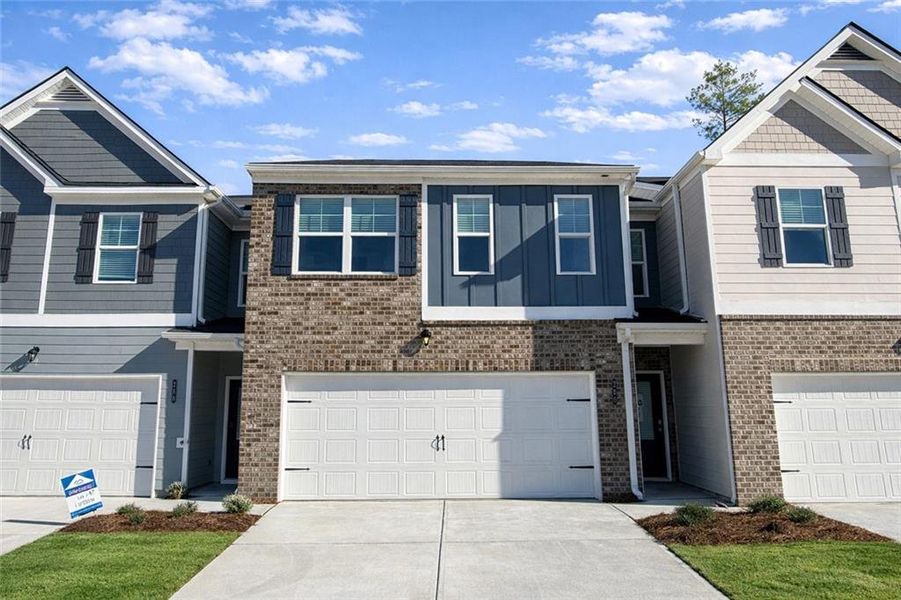 Front exterior of a new home in The Enclave at Whitewater Creek, Union City, GA, highlighting curb appeal (Image 1). Front exterior of a new home in The Enclave at Whitewater Creek, Union City, GA, highlighting curb appeal (Image 1).