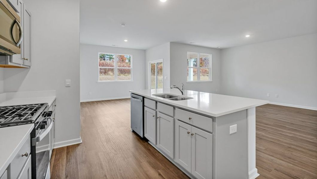 Representative furnished interior of a home built from the ARIA by D.R. Horton in Bella Point, Bolivia (Image 8).
