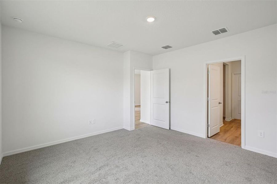 Spacious, unfurnished interior of a new home in Two Rivers - Premier Series, Zephyrhills (Image 25). Spacious, unfurnished interior of a new home in Two Rivers - Premier Series, Zephyrhills (Image 25).