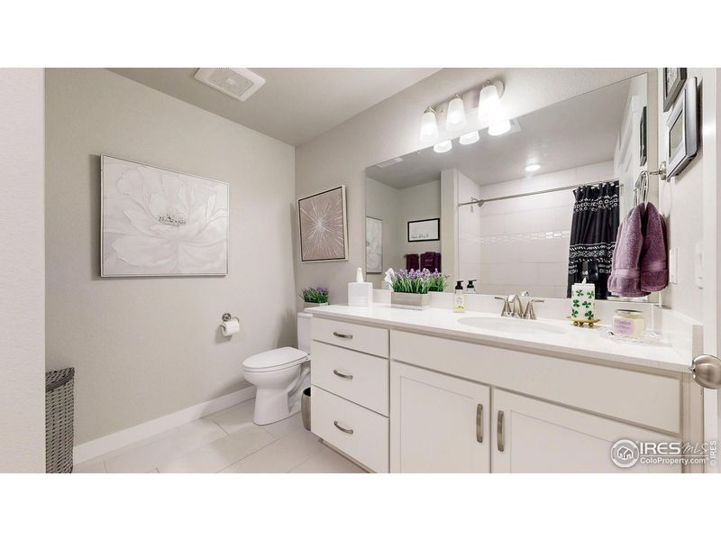 Furnished interior view inside a new home in The Lakes at Centerra - Discovery, Loveland (Image 14).