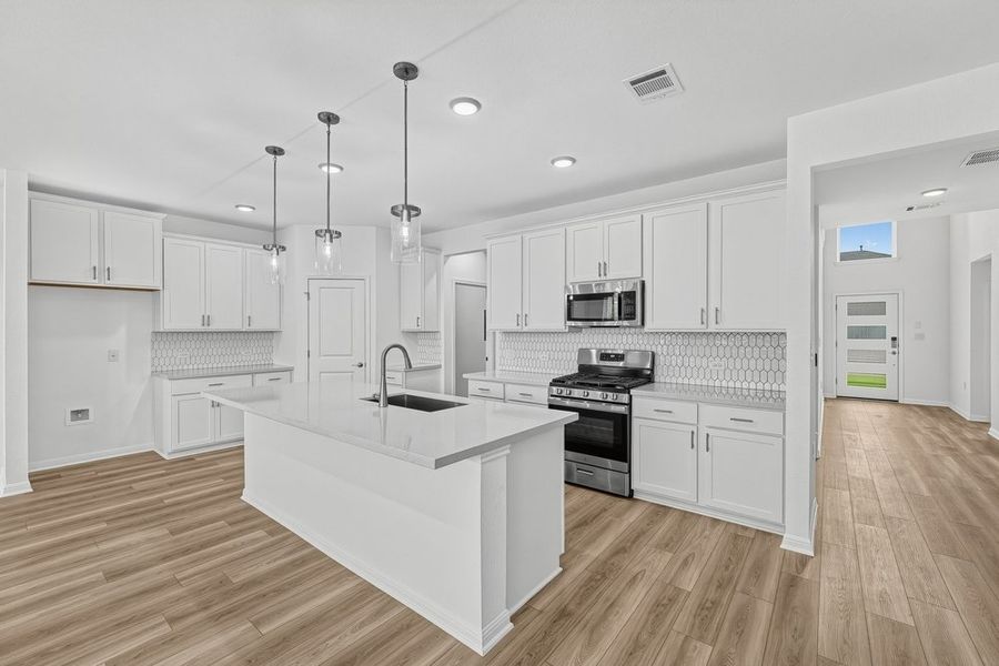Furnished interior view inside a new home in Lisso, Pflugerville (Image 5).