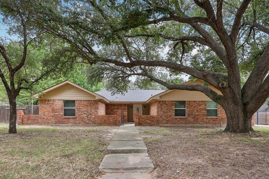 Front exterior of a new home in , Azle, TX, highlighting curb appeal (Image 22). Front exterior of a new home in , Azle, TX, highlighting curb appeal (Image 22).