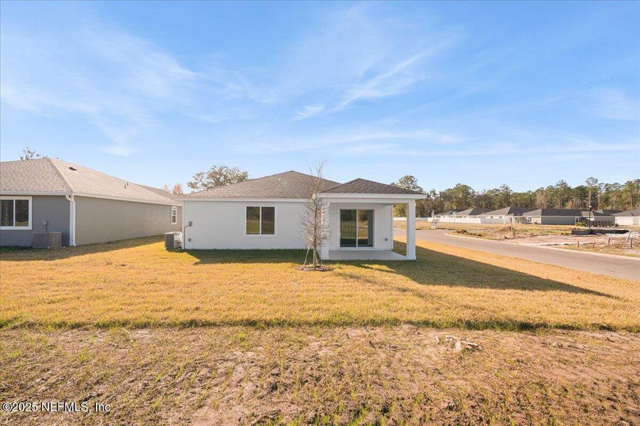 Exterior details and patio area of a home in Azalea Creek, Jacksonville (Image 23).