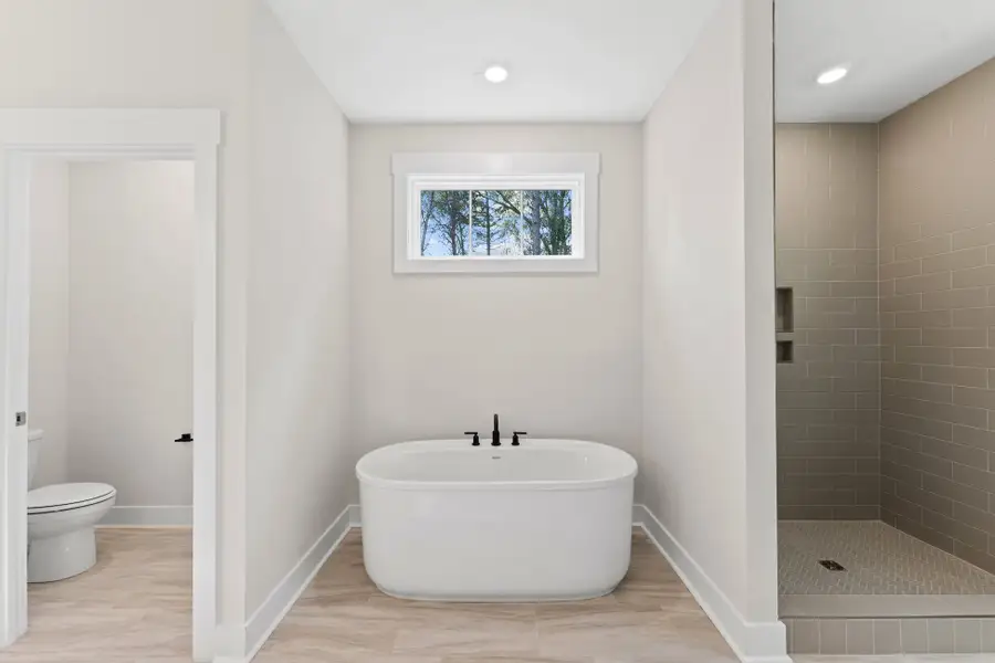 Representative furnished interior of a home built from the Chadwick by Hunter Quinn Homes in Walker's Pointe, Anderson (Image 12).