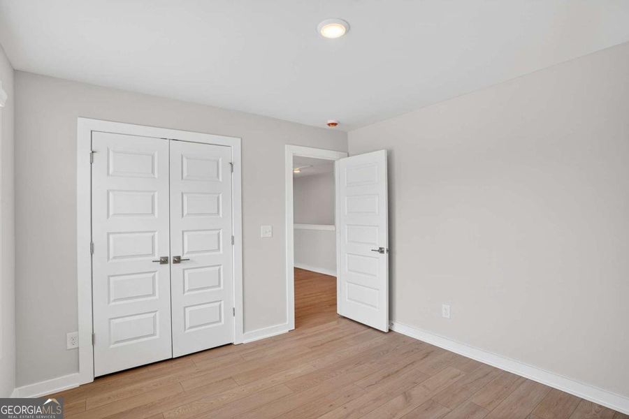 Spacious, unfurnished interior of a new home in The Fairways at Mirror Lake, Villa Rica (Image 61). Spacious, unfurnished interior of a new home in The Fairways at Mirror Lake, Villa Rica (Image 61).