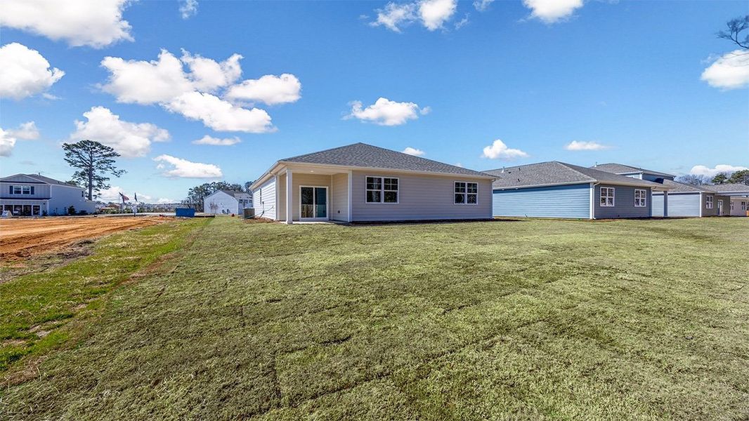 Front exterior of a new home in Sease's Pond, Gilbert, SC, highlighting curb appeal (Image 18). Front exterior of a new home in Sease's Pond, Gilbert, SC, highlighting curb appeal (Image 18).
