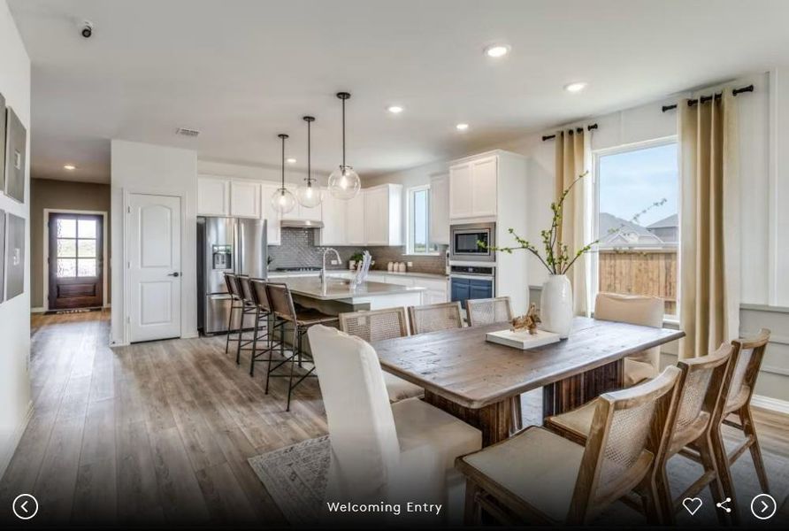 Interior photos- Photo of Pulte model home with same floor plan, not of actual home listed.