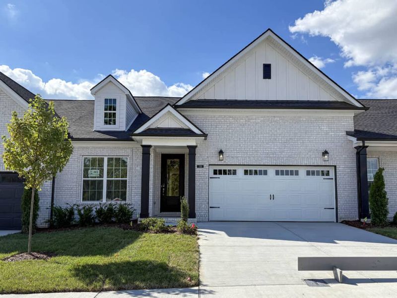 Front exterior of a new home in Stonecrest Townhomes, Hendersonville, TN, highlighting curb appeal (Image 1). Front exterior of a new home in Stonecrest Townhomes, Hendersonville, TN, highlighting curb appeal (Image 1).