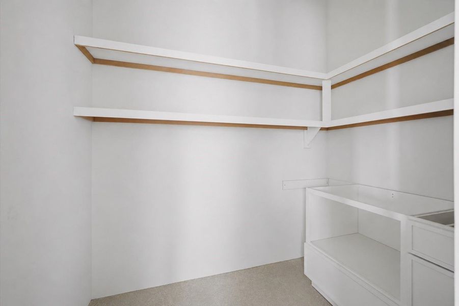 Walk-in closet for first floor bedroom Walk-in closet for first floor bedroom